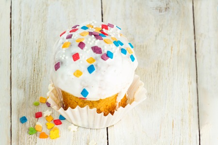 Tasty cake for holidays on a wooden table with copy space
