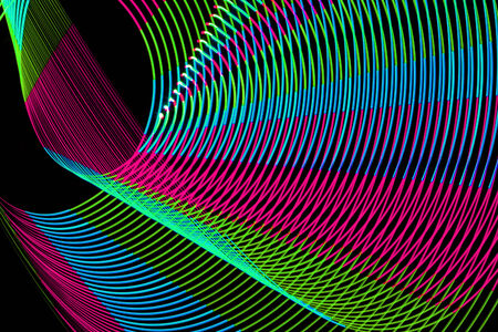 Abstract curved lines made of light painting or freezelight.
