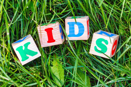 Kids sign made of wooden blocks outdoorsの写真素材