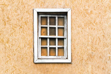 Vintage window on wooden wall outdoorsの写真素材