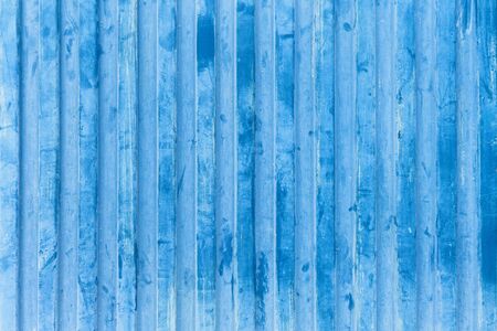 Old blue wall texture. Abstract blue fence backgroundの写真素材