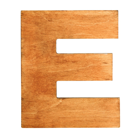 Old wooden letter E on wooden background. Vintage wooden letter E. One of full alphabet wooden setの写真素材