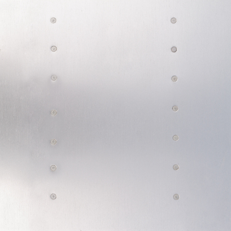 Abstract steel metal texture with rivetsの写真素材