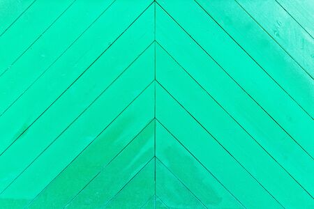 Green painted wooden wall fenceの写真素材