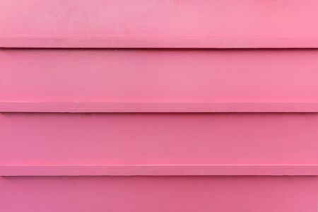 Pink wooden painted background as textureの写真素材