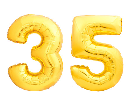 Golden number 35 thirty five of inflatable balloon isolated on white backgroundの写真素材