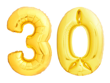 Golden number 30 thirty made of inflatable balloon isolated on white backgroundの写真素材