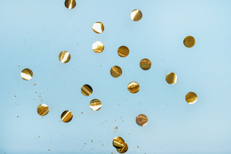 Abstract blue background with golden confetti. Top view. Flat layの写真素材