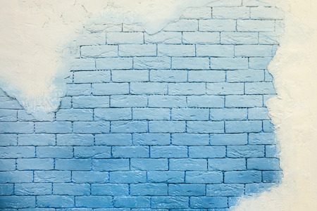 Background of grunge brick wall with plaster textureの写真素材