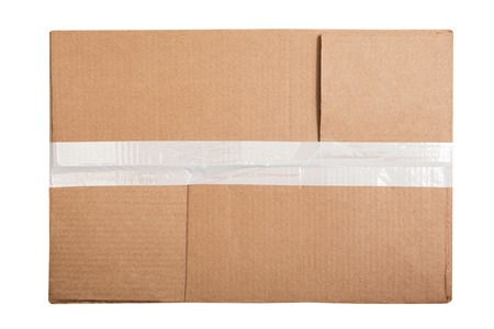 Top view of rectangular cardboard box with a sticky tape isolated on white backgroundの写真素材