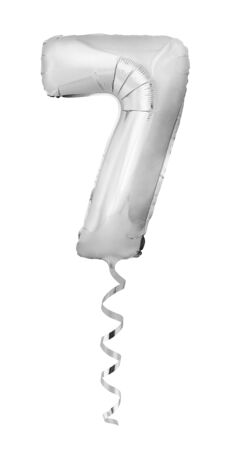 Silver chrome number 7 seven made of inflatable helium balloon with a ribbon isolated on white background. Silver party flying balloonの写真素材