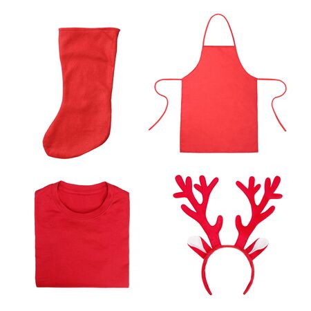 Set of Christmas objects including antlers of a deer headband, red folded t-shirt, red apron, red Christmas sock isolated on white backgroundの写真素材