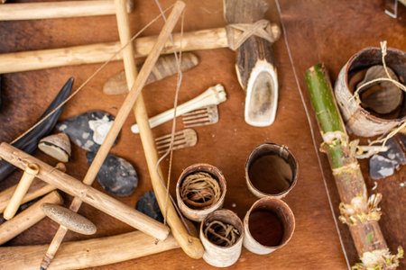 Old tools and materials for making handicrafts on wooden background.の写真素材