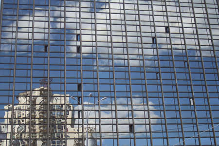 Reflection of clouds in the buildingの素材