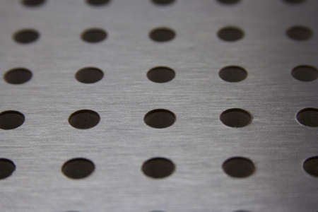 Perforated background close upの素材