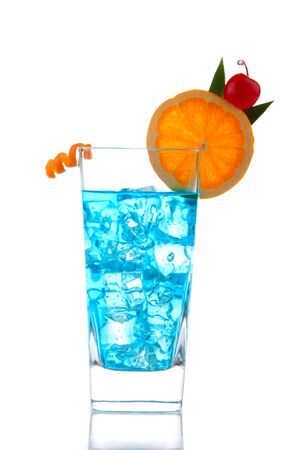 Blue Lagoon Cocktails with vodka, light rum, gin, tequila, blue curacao, lime juice, lemonade, orange wheel, maraschino cherry isolated on a white backgroundの写真素材