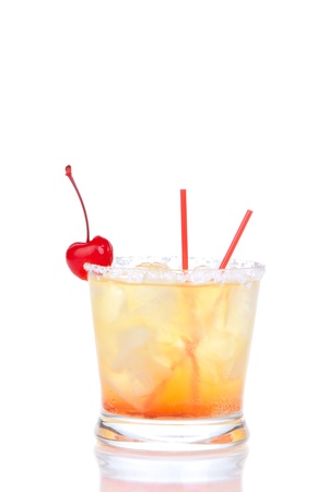 Alcohol cocktail long island iced teas with crushed ice, red cherry, straws, lime in small glass isolated on white background の写真素材
