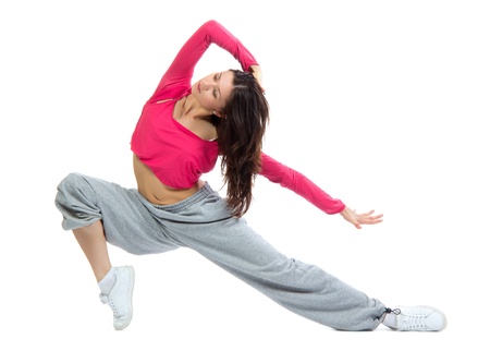 Modern dancer girl warming up, dancing, stretching on a white backgroundの写真素材