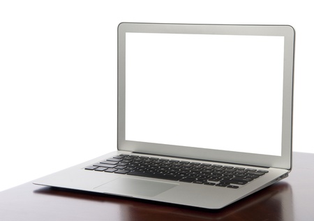 Modern thin  light weight  laptop computer with keyboard and white screenの写真素材