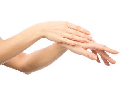 Beautiful woman hands with french manicure nails isolated on a white backgroundの写真素材