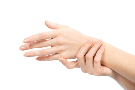 Beautiful woman hands with french manicure nails isolated on a white backgroundの写真素材