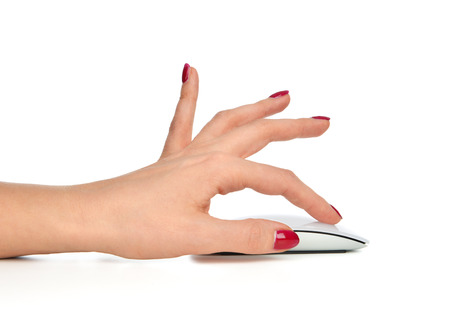 Hand click on modern computer wireless mouse on a white backgroundの写真素材