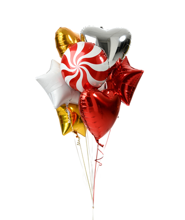 Bunch of big white red and gold heart star and candy balloon objects for birthday party isolated on a white backgroundの写真素材