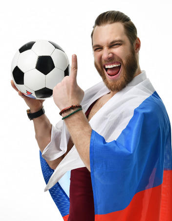 Happy man soccer fan wearing Russian flag and show number one winning finger smiling celebrating isolated on white backgroundの写真素材