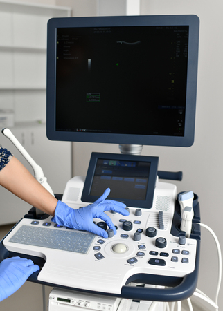 Hand touch button for medical device for ultrasound examination of the body for the purpose of diagnosis in cabinetの写真素材