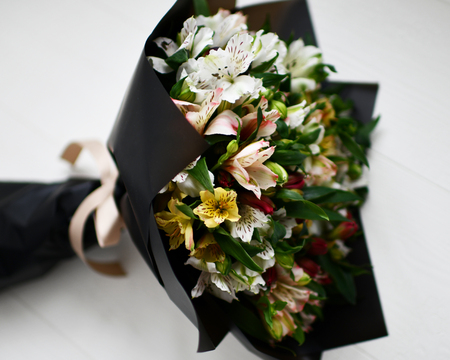Bouquet of flowers white grey backgroundの写真素材