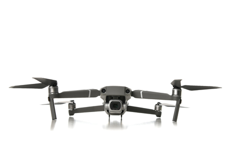 New drone quadcopter with digital camera isolated on white backgroundの写真素材