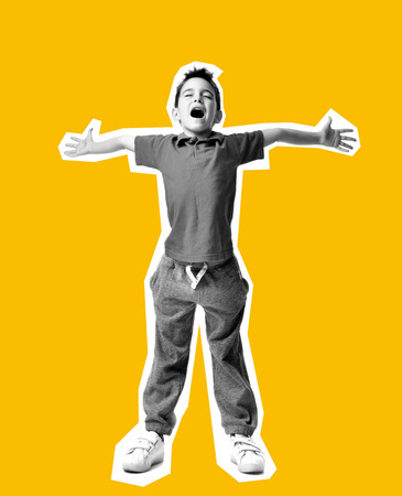 Magazine style collage with colorful emotional young boy kid spread hands up crazy screaming laughing on yellow backgroundの写真素材