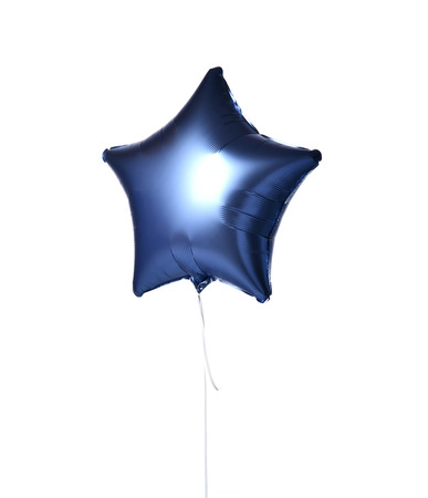 Single light blue big star metallic balloon object for birthday isolated on white backgroundの写真素材
