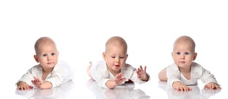 Infant child collage composition baby boy toddler lying in white shirt happy smiling playing isolated on a white backgroundの写真素材