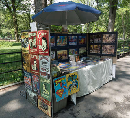 Souvenirs and vintage posters sale tray in the Central Park of New York