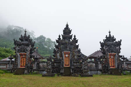 Hindu temple Pura Ulun Danu Buyan at Lake Buyan in the central part of Bali near Bedugul villageの写真素材