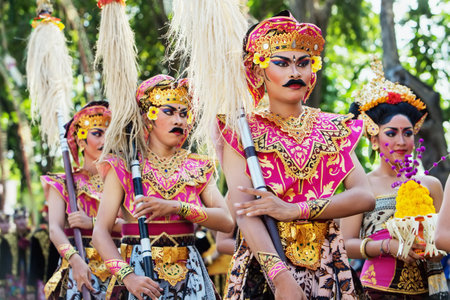 BALI INDONESIA  JUNE 13: Unidentified people with traditional makeup on their faces and dressed in Balinese warrior costumes on parade at Bali Art Festival in Denpasar Bali on 13 June 2015のeditorial素材