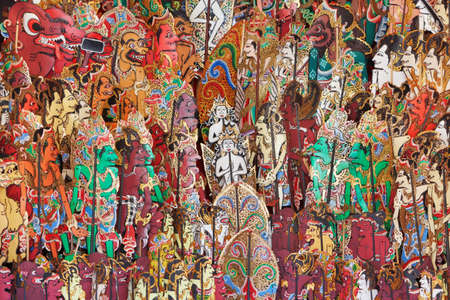 Traditional characters of balinese and javanese folk shadow puppets show - wayang kulit. Arts, indigenous crafts on Bali island and culture festivals of Indonesian people. Asian travel backgrounds.の写真素材