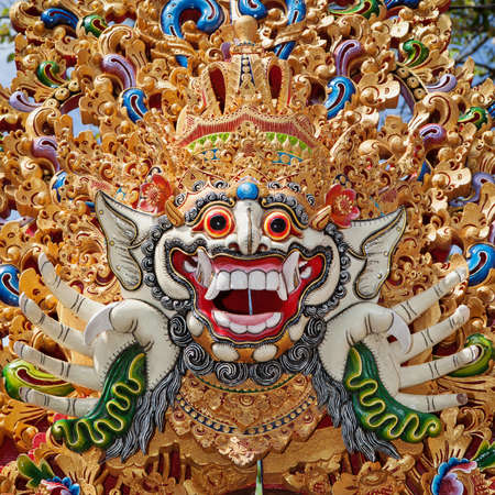 Traditional Barong mask pattern in temple - protective spirit, Bali island symbol. Featured in...