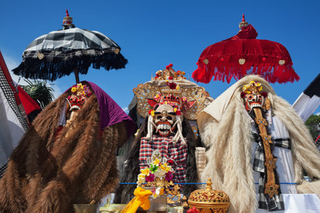 Traditional Barong and Rangda masks. Bali island spirit at ceremony Melasti and ritual temple dance before Balinese New Year, silence day Nyepi. Holidays, festivals, art, culture of Indonesian people.のeditorial素材