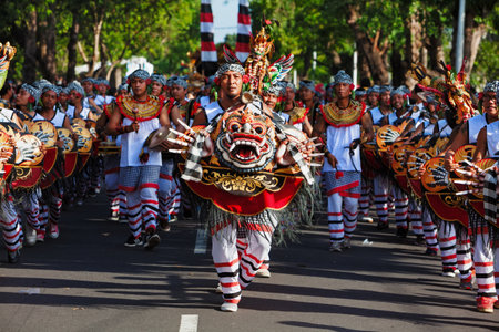 Denpasar, Bali island, Indonesia - June 10, 2017: Group of Balinese people. Musician men of...