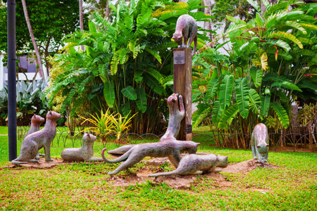 Kuching, Malaysia - March 13, 2019: Group of funny cats metal statue at Sarawak river waterfront park. Cat is a symbol of Kuching city on Borneo islandのeditorial素材
