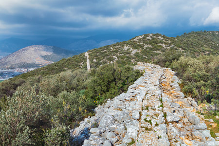 Ruins of old Roman Aqueduct. View Delikkemer Bridge at olive forest near Mediterranean sea coast. Near to Patara Ancient City at location Kalkan, Kas, Antalya. Popular travel destination in Turkeyの写真素材