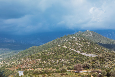 Ruins of old Roman Aqueduct. View Delikkemer Bridge at olive forest near Mediterranean sea coast. Near to Patara Ancient City at location Kalkan, Kas, Antalya. Popular travel destination in Turkeyの写真素材