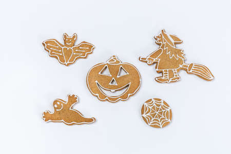 Halloween homemade Ginger and Honey cookies on white background.の写真素材