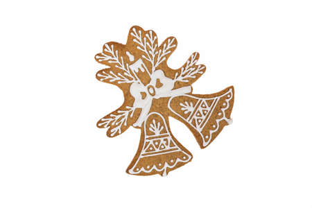 Homemade bell gingerbread and honey cookies on nice christmas theme on white background.の写真素材