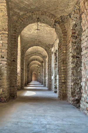 Castle tunnel with a series of arches in the ruined Bastion .の写真素材
