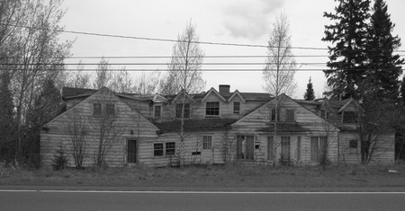 Abandoned roadside houseの写真素材