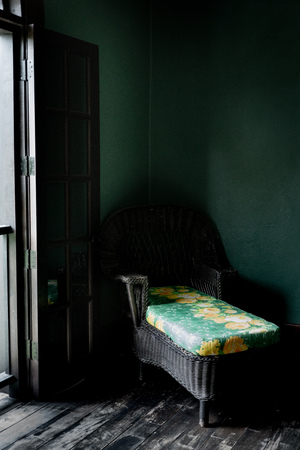 Dark chair in a cornerの写真素材