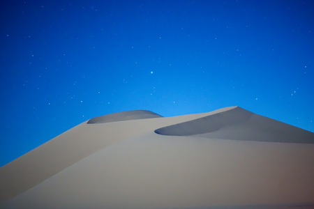Sand dunes at nightの写真素材